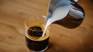 espresso typically lacks milk