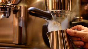 steaming milk with espresso